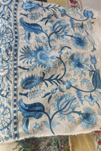 Load image into Gallery viewer, Ethically made artisan block print pure cotton table cloth, shades of blue on white floral design with border. Showing the sampling process.
