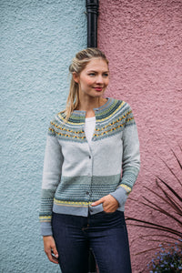 Eribe made in Scotland Alpine fairisle cardigan in Kelpie, ash grey with highlights in sage and olive green, yellow and orange.