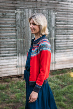 Load image into Gallery viewer, Eribe Alpine short cardigan in Crabapple, bright red with shades of blue and orange.