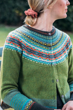 Load image into Gallery viewer, Eribe Alpine short cardigan in Moss, with chocolate, aqua and yellow.
