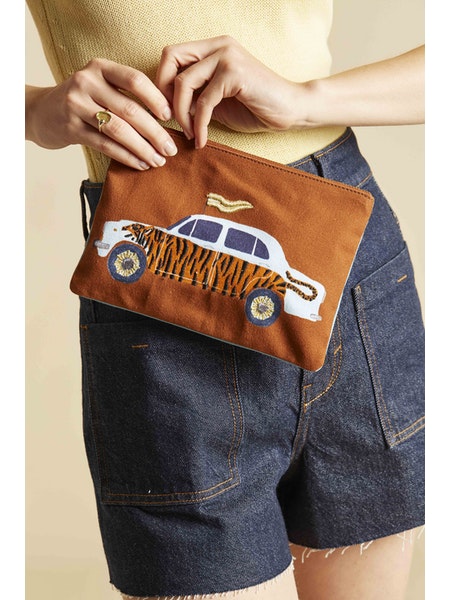 Inoui Editions embroidered cotton pouch featuring Ambassador, orange background.