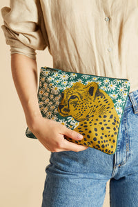 Inoui Editions cotton pouch featuring Pampa cheetah on green and white flowers.