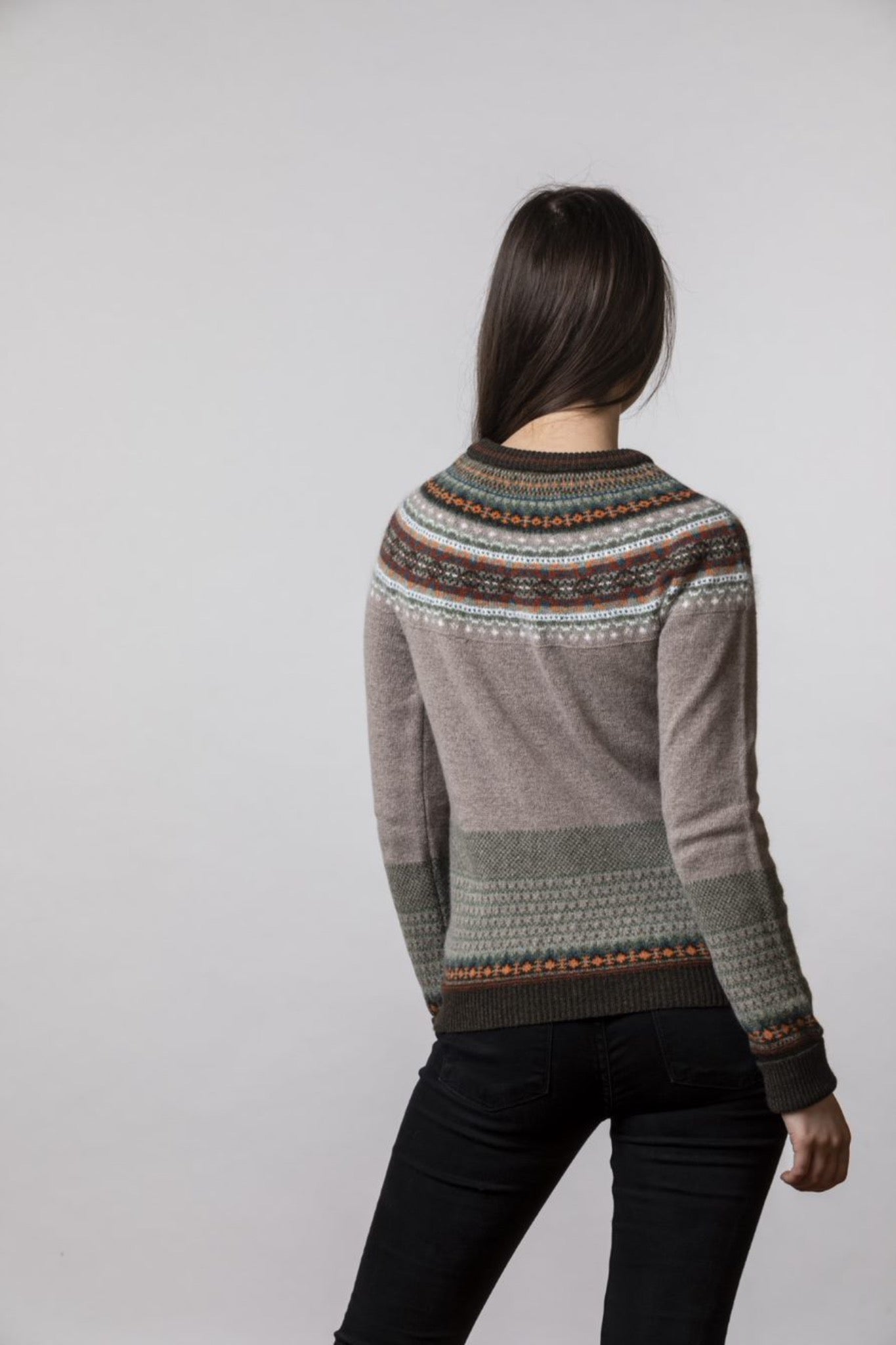 Eribé made in Scotland Alpine cardigan, fairisle knit in oatmeal, with chocolate, orange and aqua highlights.