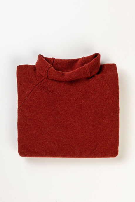 Eribé made in Scotland merino wool Corry sweater, roll neck raglan in Rusty, brick red.