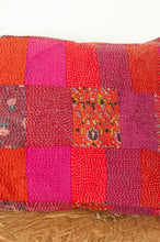 Load image into Gallery viewer, Juniper Hearth vintage silk kantha patchwork bolster cushion in shades of tangerine red orange, bright pink and floral print.