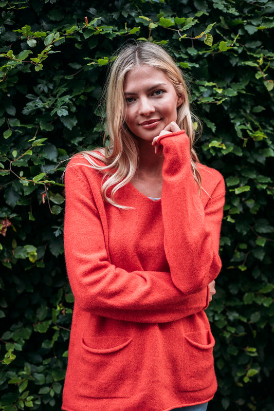 Eribe made in Scotland V-neck Corry pocket sweater in inferno.