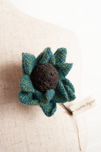Load image into Gallery viewer, Sophie Digard brooch, made by hand in Madagascar, Asperule single flower crocheted in merino wool in deep turquoise with a chocolate brown centre.