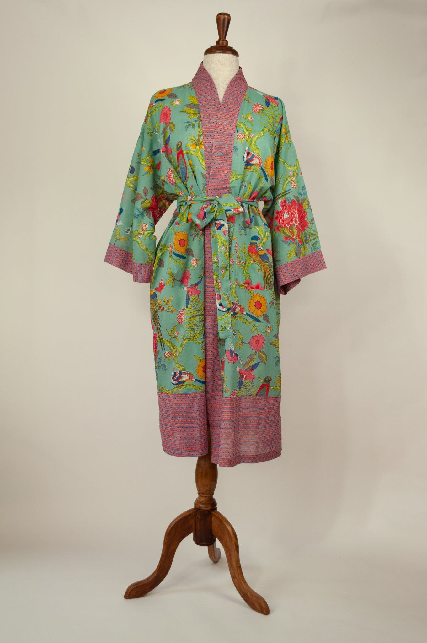 Cotton voile kimono robe dressing gown in aqua bird print with pink trim.