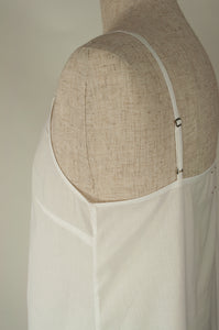 Ladies pure cotton voile full slip or petticoat, showing detail of adjustable straps in white.