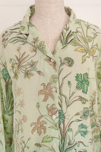 Juniper Hearth ethically made cotton voile full length pyjamas, beautiful vanilla, light turquoise and taupe floral print on soft celadon green background.