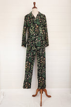 Load image into Gallery viewer, Juniper Hearth ethically made cotton voile full length pyjamas, beautiful vanilla and emerald green floral print on black background.