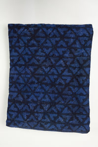 VIntage kantha quilt overdyed with natural indigo using the mud resist technique, double dyed blue on blue arrow pattern.