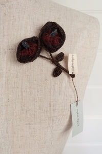 Sophie Digard Neet knitted wool brooch in Dingle colourway, chocolate brown and russet red.