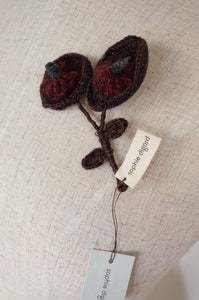 Sophie Digard Neet knitted wool brooch in Dingle colourway, chocolate brown and russet red.