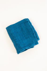 Waffle weave pure linen wash cloth face cloth. In teal blue.