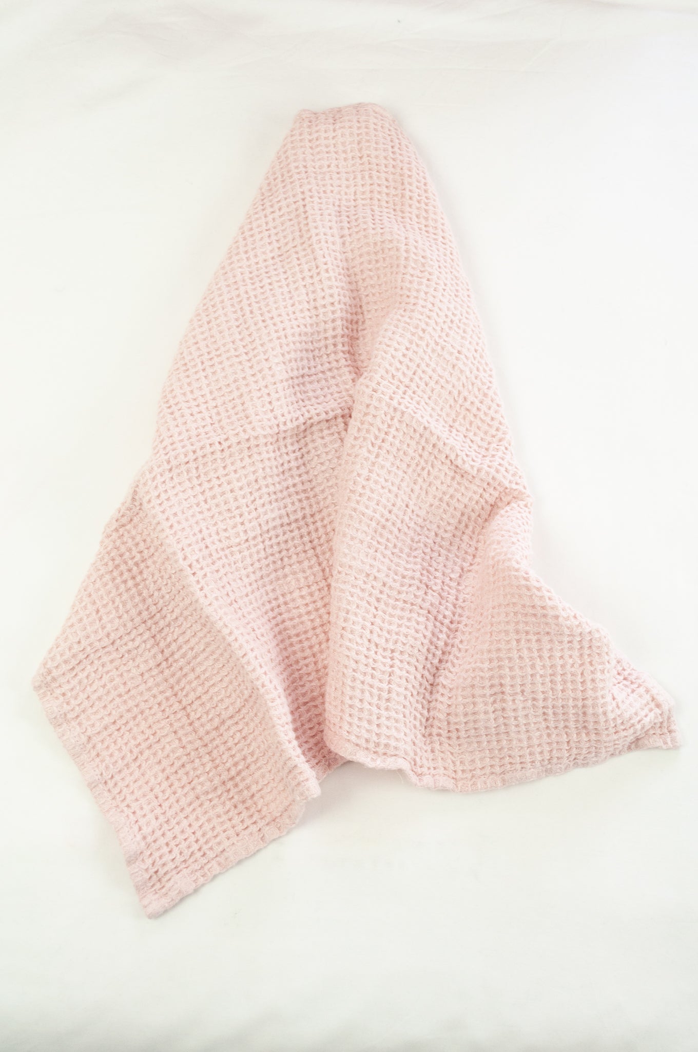 Waffle weave pure linen hand towel, made in Lithuania. In pale rose pink.