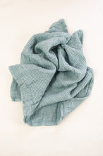 Load image into Gallery viewer, Waffle weave pure linen hand towel, made in Lithuania. In steel blue.