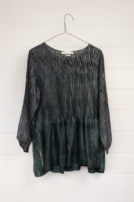 Juniper Hearth Asha top in deep marine, shibori dyed silk in shades of midnight navy and emerald green, long sleeve pintucked loose fitting round neck top.
