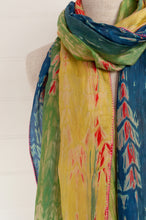 Load image into Gallery viewer, Neeru Kumar 100% silk shibori dyed scarf in lemon, lime, aqua and blue with highlights in vermilion red, tassels and edge stitching in pink.