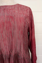 Load image into Gallery viewer, Juniper Hearth silk shibori Asha top with pin tucked bodice and long sleeves in deep raspberry red with pewter grey accents.