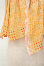 Load image into Gallery viewer, Anna Kaszer fine cotton voile scarf, geometric pattern in pale orange, aqua, red geometric design.