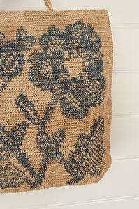 Sophie Digard crocheted raffia large square bag, teal floral embroidery on natural flax background.