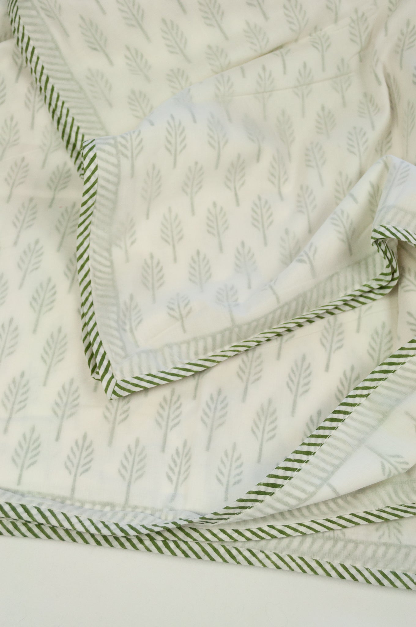 Cotton muslin dohar olive green on white, small palm tree print, blockprinted by hand in Jaipur.