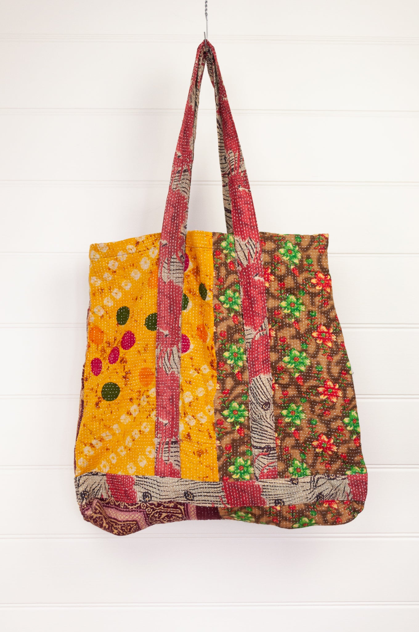 Vintage kantha tote bag with internal pocket, multi patterned and multi coloured, flowers and dots in red, green, gold and brown.