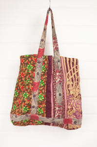 Vintage kantha tote bag with internal pocket, multi patterned and multi coloured, flowers and dots in red, green, gold and brown.