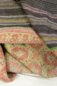 Vintage kantha quilt, heavier weight Mayra, striped patchwork in black and olive green with bright pops of colour, soft vintage green and red floral on reverse.