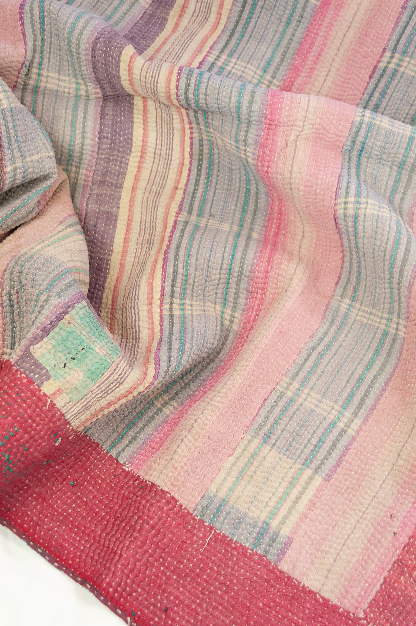 Vintage kantha quilt Radha, heavier weight patchwork, stripes in rose pink, mint green and shades of mauve, emerald green and green check on the reverse.