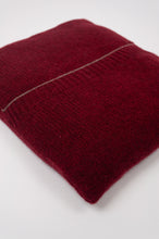 Load image into Gallery viewer, Juniper Hearth baby yak poncho in Cherry Red (close up, in pouch).