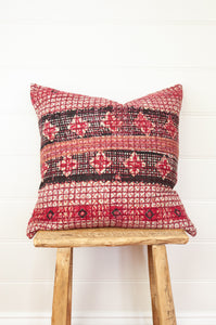 Vintage kantha quilt cushion, overdyed with red and white and black blockprint dotted check pattern.