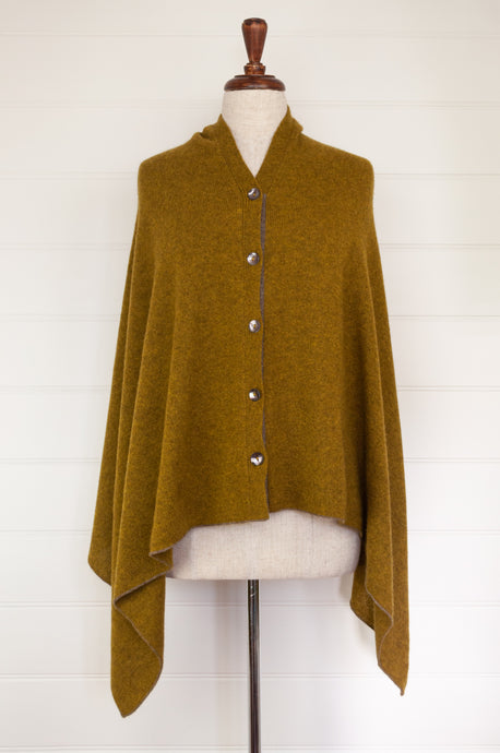 Juniper Hearth baby yak wool poncho in Weed, a deep yellow olive green shade.