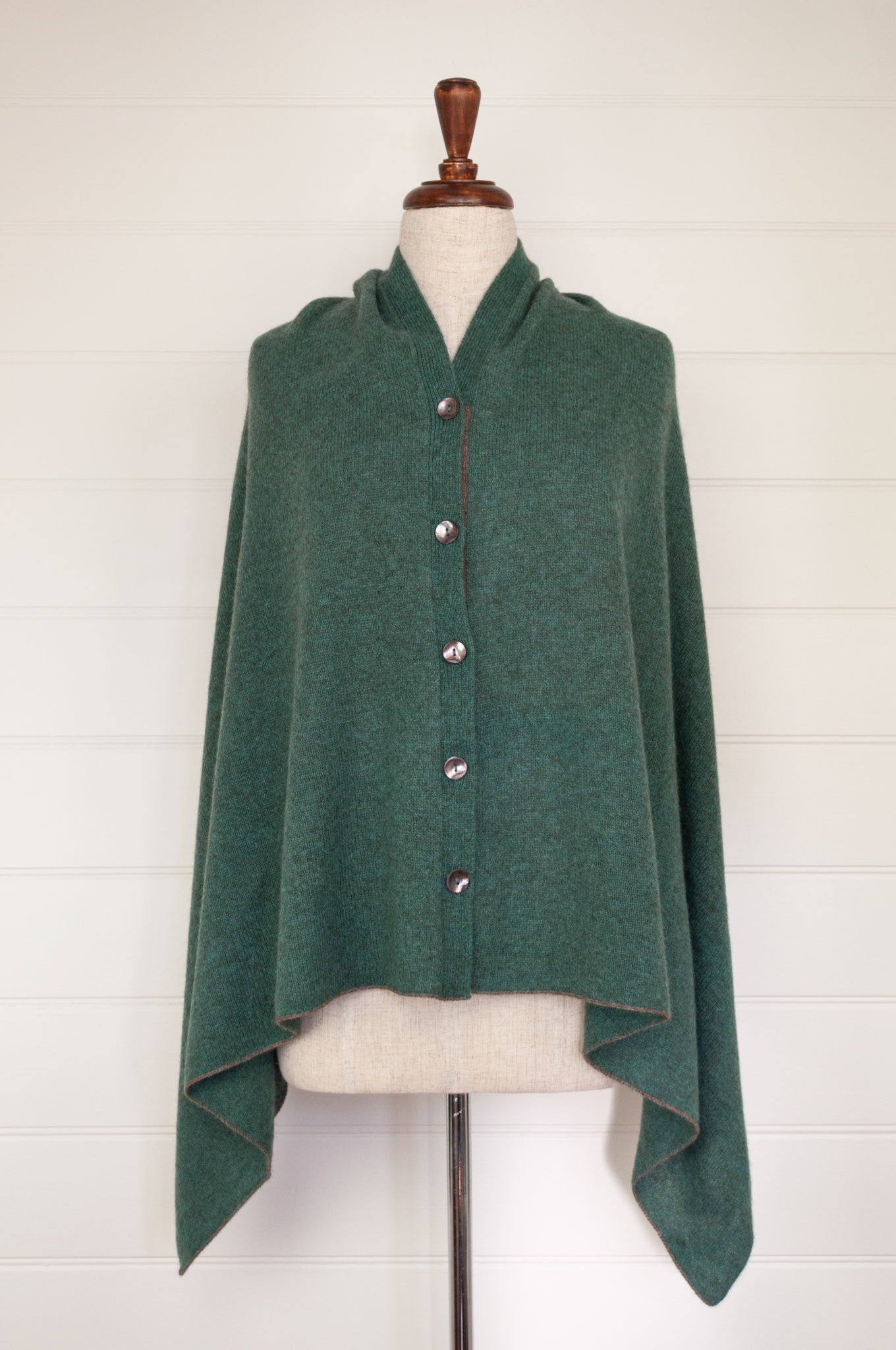 Juniper Hearth baby yak poncho in Opal, a shade of blue green.