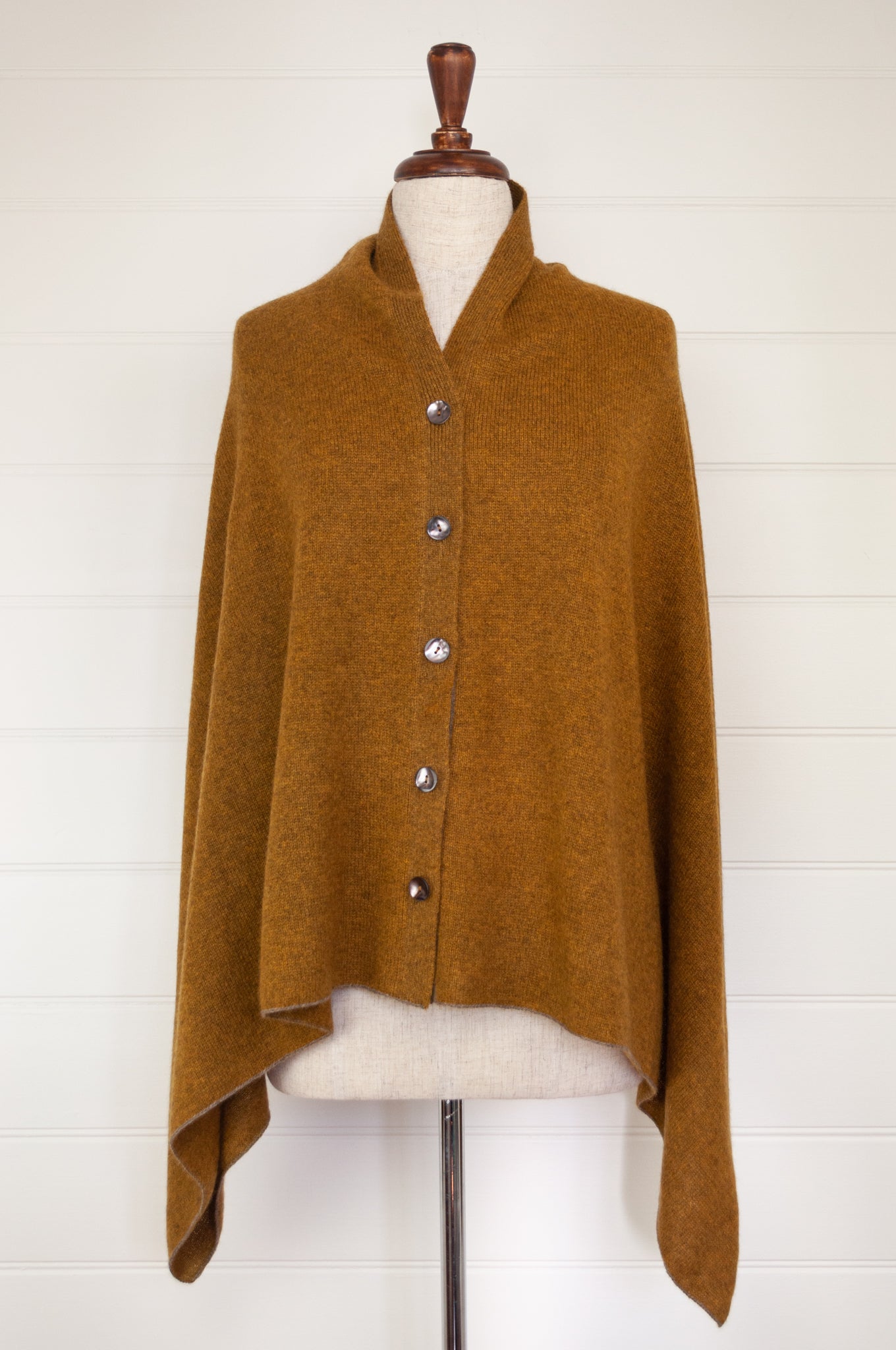Juniper Hearth baby yak wool poncho in Maize, a deep mustard gold.