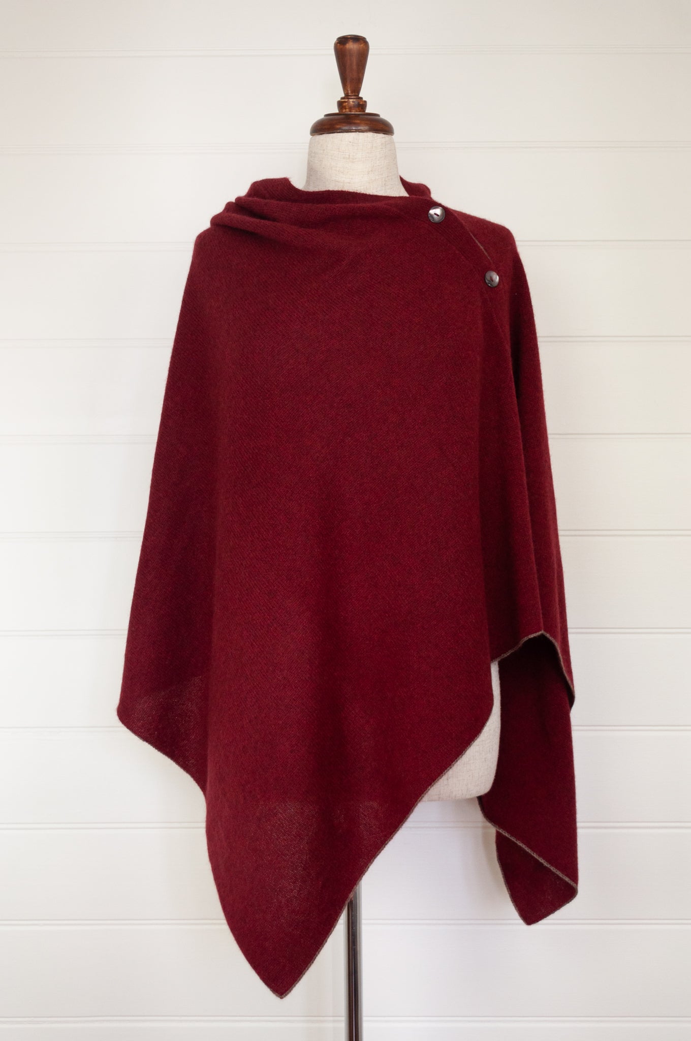 Juniper Hearth baby yak poncho in Cherry Red.