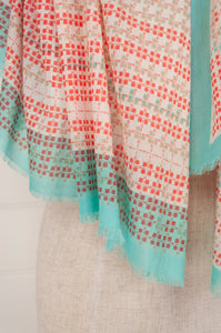Anna Kaszer designed in Paris, made in India fine cotton voile scarf in aqua, coral, taupe and white geometric pattern.