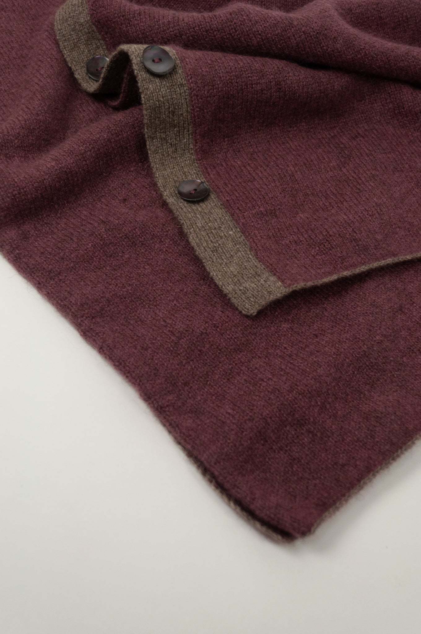 Juniper Hearth baby yak wool poncho in light plum, close up.