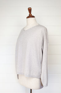 One size slouchy V-neck sweater in cashmere cotton, light ash grey. Ethically made in Nepal.