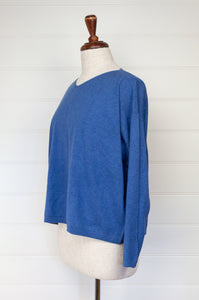 One size slouchy V-neck sweater in cashmere cotton, marine blue. Ethically made in Nepal.