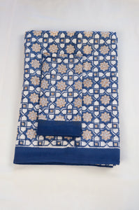 Blockprinted cotton table cloth, Almira Moroccan tile print in indigo denim blue and white with soft gold highlights. 