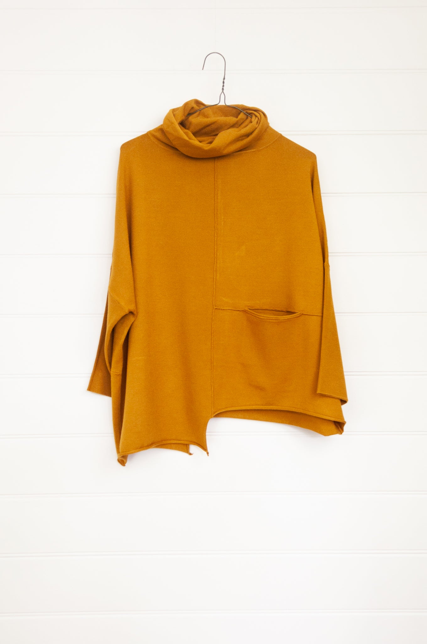Banana Blue designed in Melbourne box jumper with roll neck in mustard yellow poly voly blend.