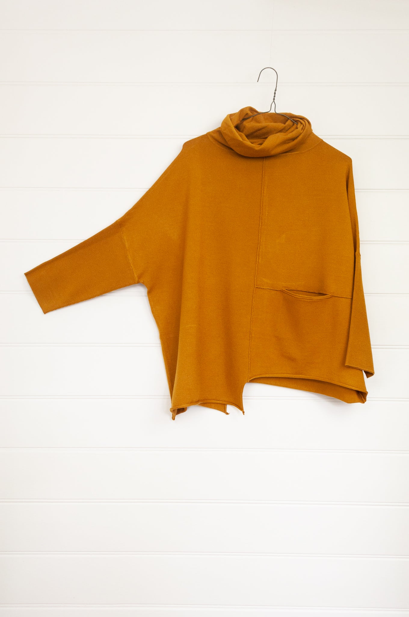 Banana Blue designed in Melbourne box jumper with roll neck in mustard yellow poly voly blend.