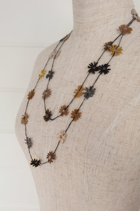 Sophie Digard long wool embroidered flower necklace in Tortuga earth tones.