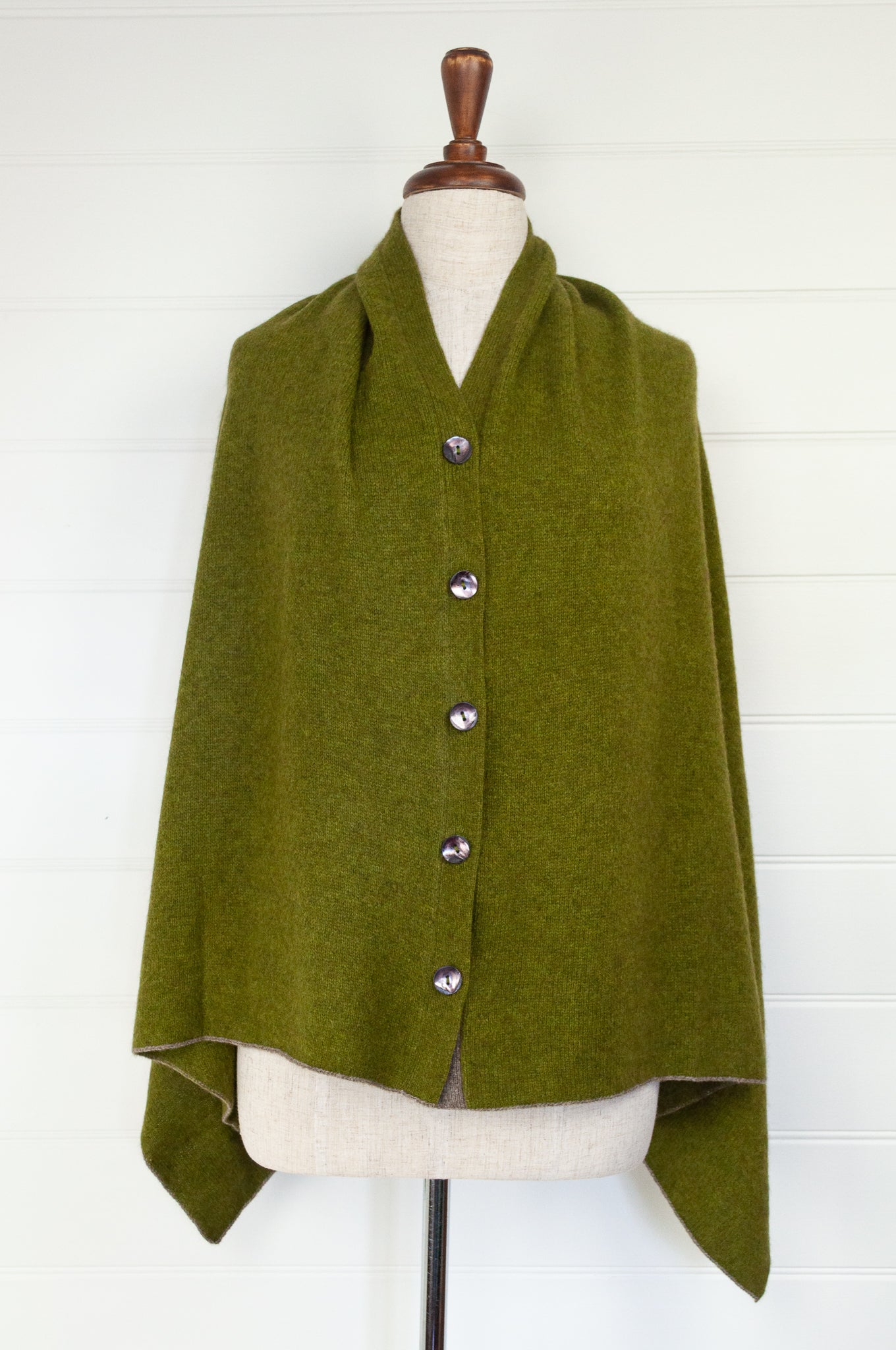 Made in Nepal one size button up poncho in chartreuse green.