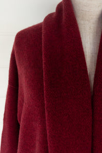 One size, longline boyfriend cardigan with shawl collar, in cherry red baby yak wool made in Nepal.