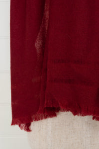Juniper Hearth woven cashmere scarf featuring fagoting detail and fringed at ends, in cherry red.