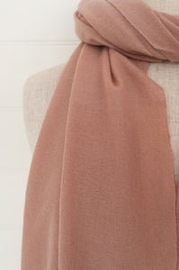 Juniper Hearth woven cashmere scarf featuring fagoting detail and fringed at ends, in vintage rose pink.