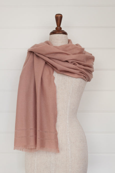 Juniper Hearth woven cashmere scarf featuring fagoting detail and fringed at ends, in vintage rose pink.